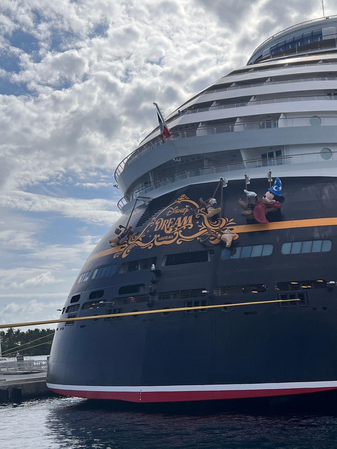 The stern of the Disney Dream with the ship's name and Sorcerer Mickey