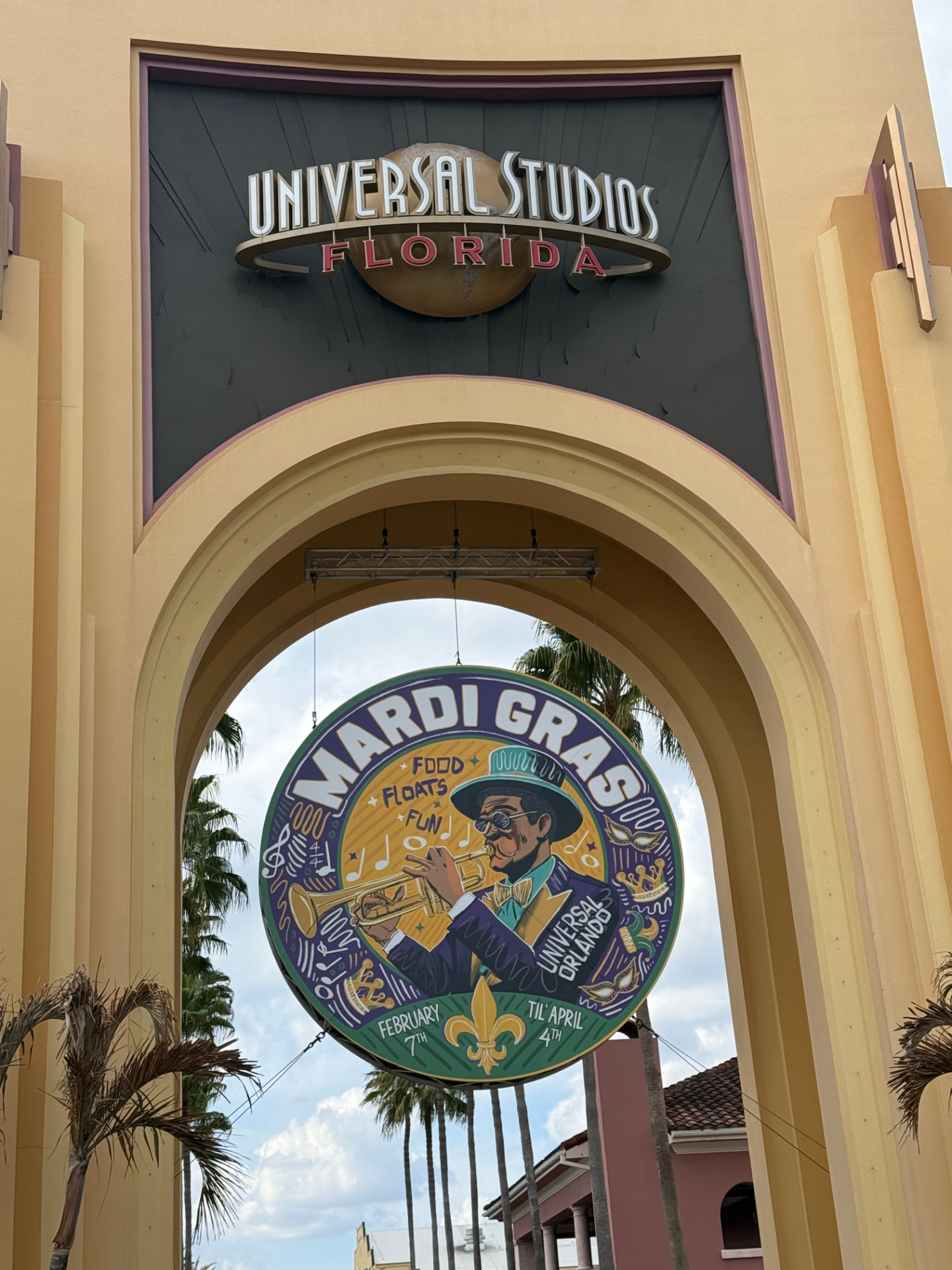 Universal Studios Florida entrance decorated for Mardi Gras