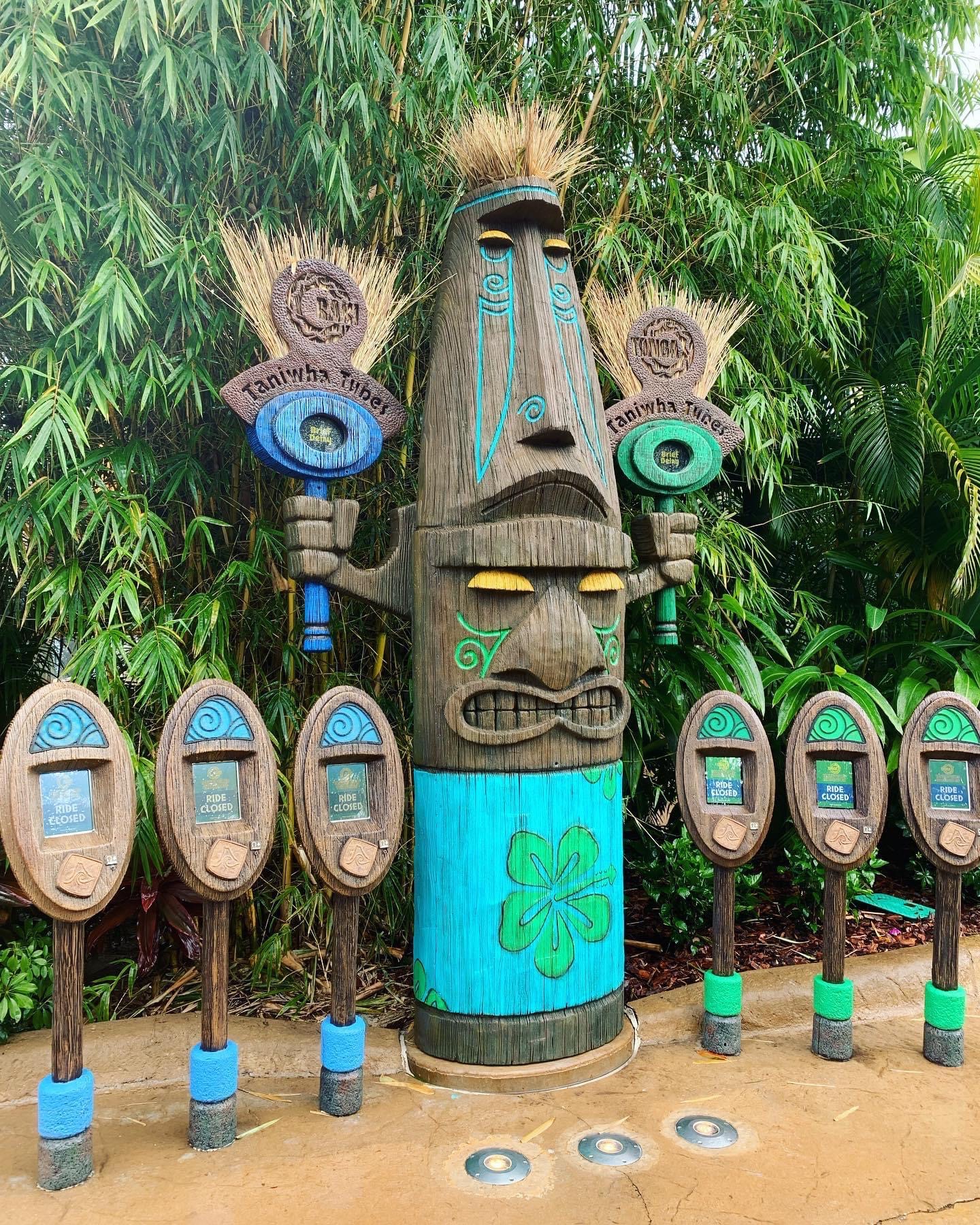 Taniwha Tubes tapu tapu ride boards among tropical greenery at Universal Volcano Bay