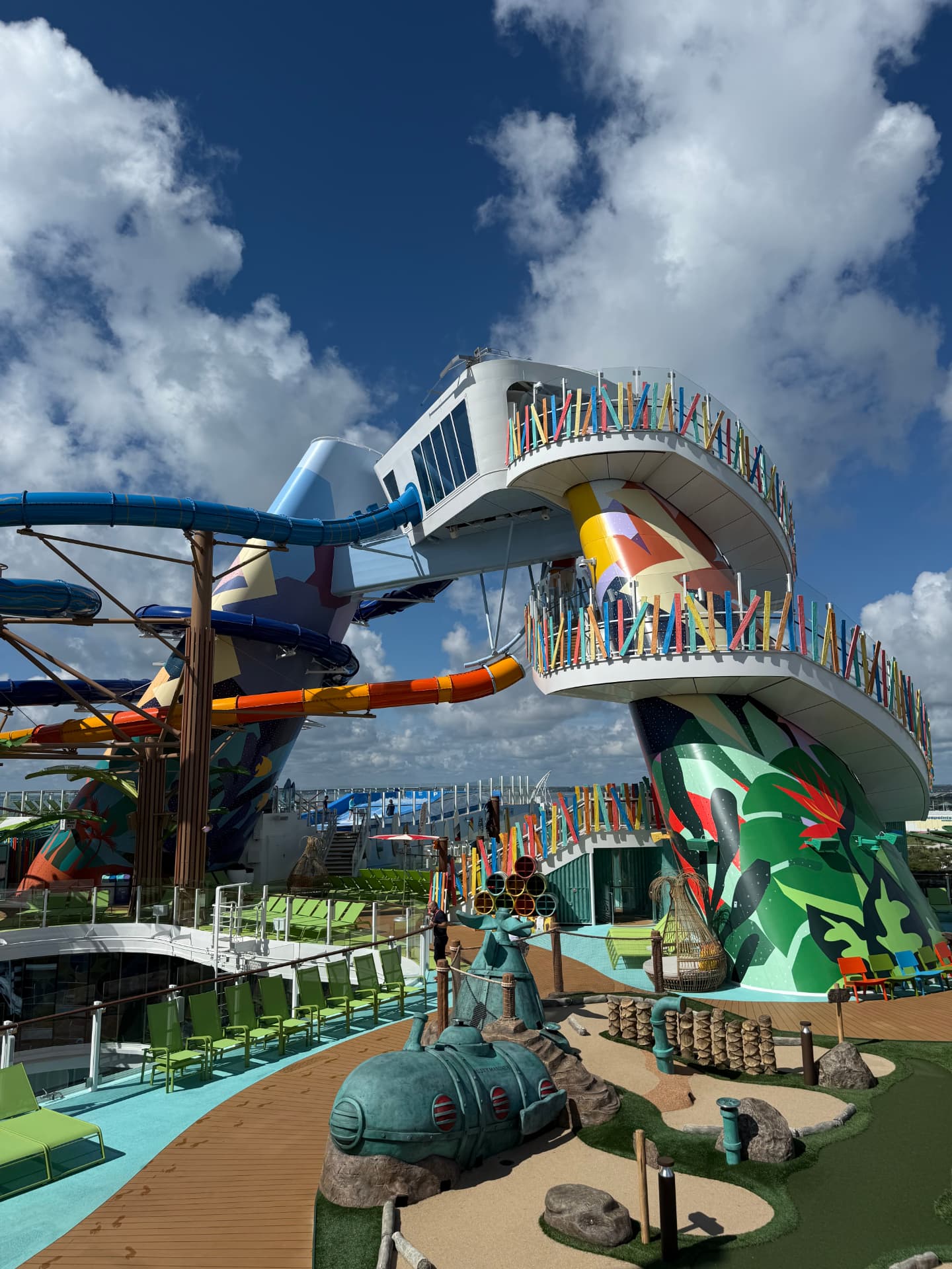 Colorful waterslide towers rising above the top deck
